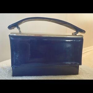 Vintage Stacy‘s luggage clutch